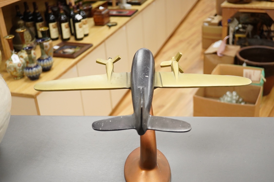 An Art Deco style mixed metal model of a WW2 plane- 24.5cm long x 24cm high